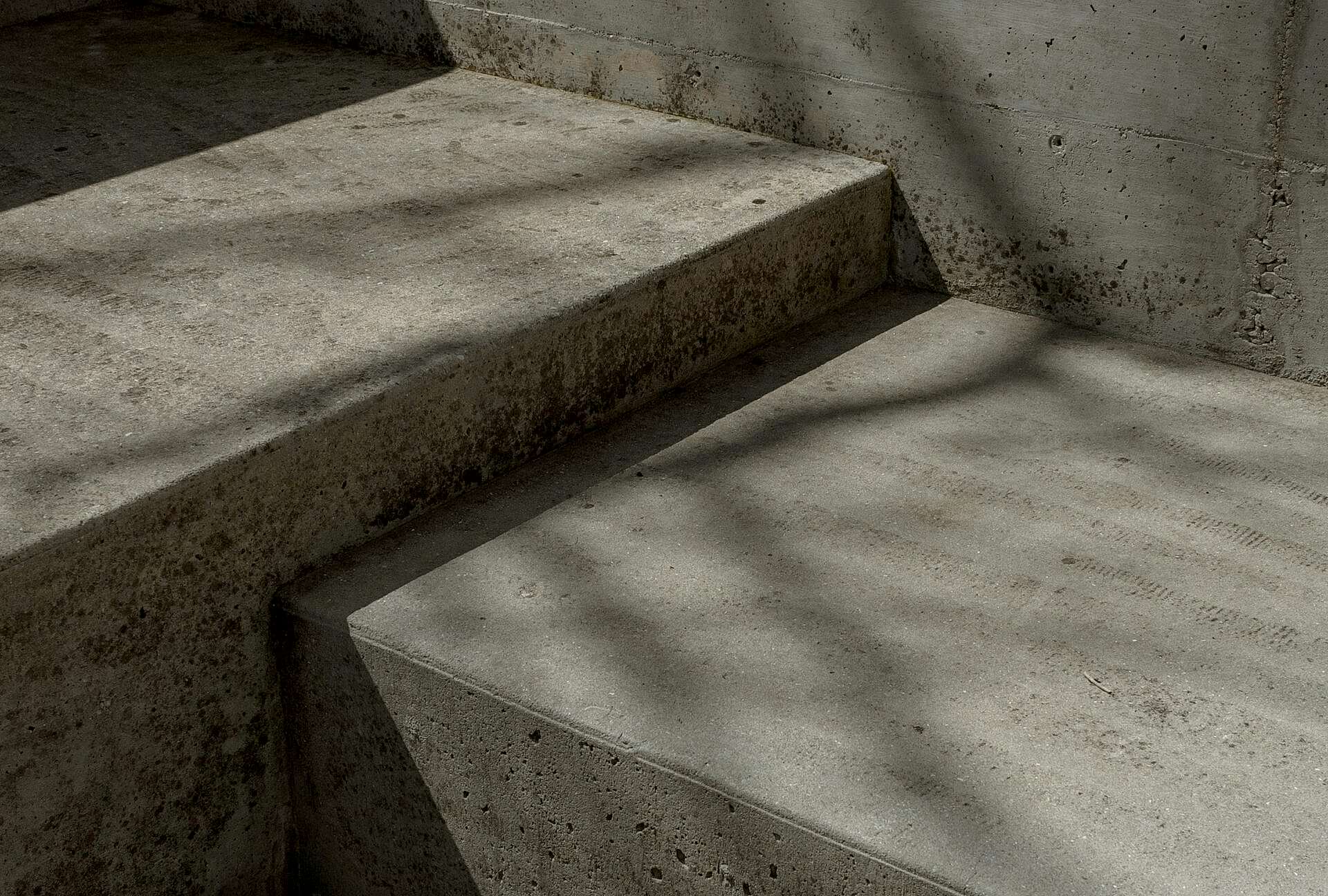 A photo of a concrete bench