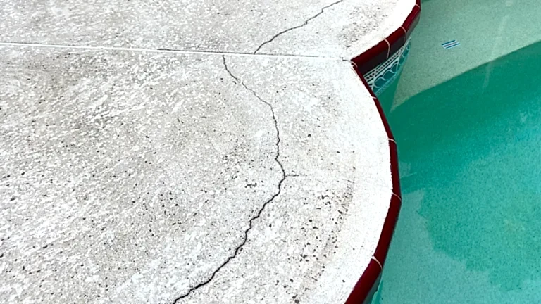 4 Crack in concrete along an in-ground pool.