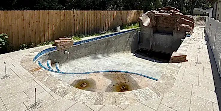 Structural polyurethane injection points inside and around a pool.